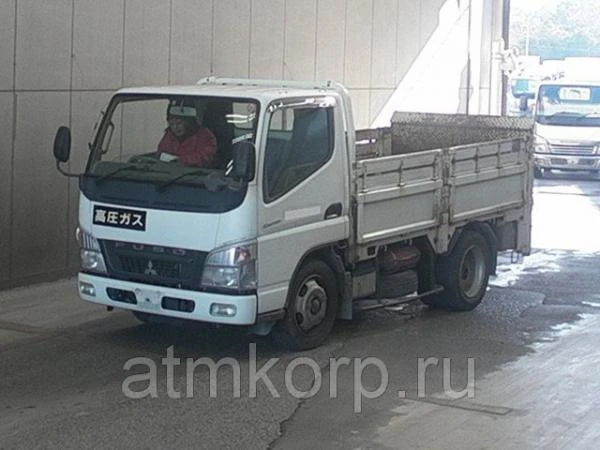 Фото Грузовик бортовой MITSUBISHI CANTER кузов FE73D гв 2008 гидроборт грузопод 3 тн пробег 203 т.км