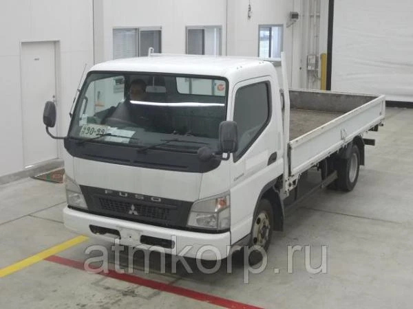 Фото Грузовик бортовой MITSUBISHI CANTER кузов FE82B год выпуска 2008 грузоподъемность 2 тонны пробег 18 тыс км