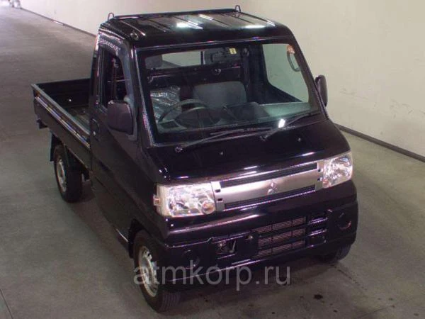 Фото Микрогрузовик бортовой MITSUBISHI MINICAB TRUCK гв 2010 полный привод 4х4 груз 0,35 тн пробег 77 т.км