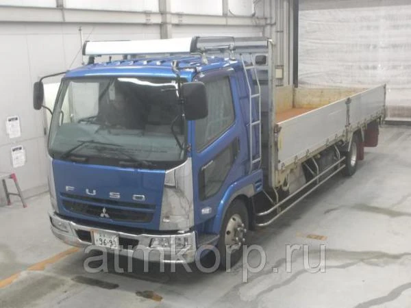 Фото Грузовик бортовой MITSUBISHI FUSO гв 2011 лестница багажник борт 3,15 тн длина 6,71 м пробег 415 т.км