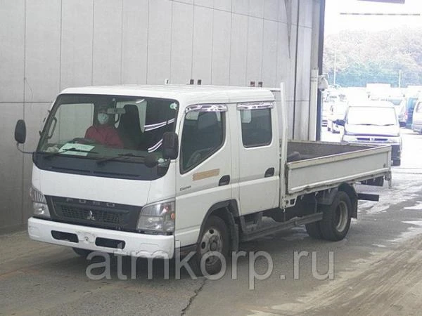 Фото Грузовик двухкабинник бортовой MITSUBISHI CANTER кузов FE82D гв 2008 кабина 6 мест груз 2 тн пробег 423 т.км