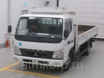 фото Грузовик бортовой MITSUBISHI CANTER кузов FE82D год вып 2010 багажник грузопод 3 тн пробег 311 т.км