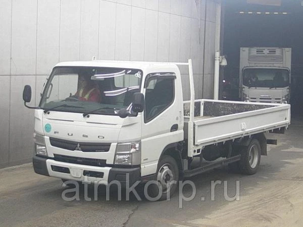 Фото Грузовик бортовой MITSUBISHI CANTER кузов FEB50 год выпуска 2012 грузоподъемность 3 тонны пробег 32 тыс км