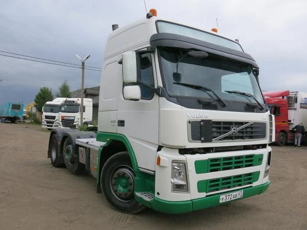 Фото Тягач Volvo FM440 6x2 самосвальный