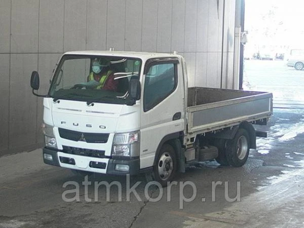 Фото Грузовик бортовой MITSUBISHI CANTER кузов FBA20 год выпуска 2012 грузоподъемность 2 тонны пробег 110 тыс км