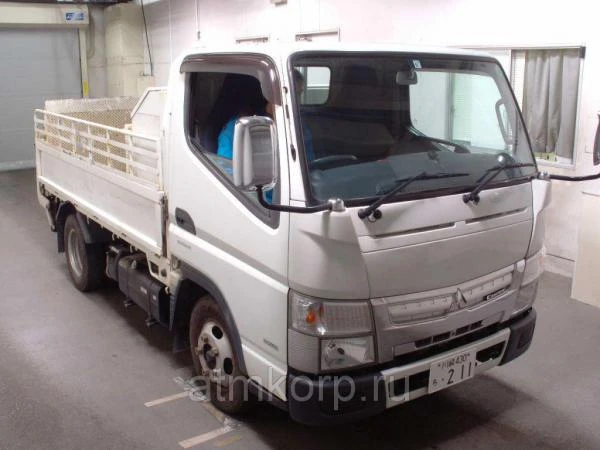 Фото Грузовик бортовой MITSUBISHI CANTER кузов FBA20 гв 2012 гидроборт грузопод 2 тн пробег 82 т.км