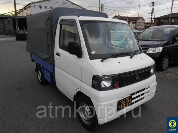 Фото Микрогрузовик бортовой тентованный MITSUBISHI MINICAB TRUCK кузов U61T гв 2008 груз 0,35 тн пробег 125 т.км