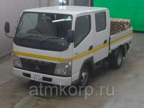 Фото Грузовик двухкабинник бортовой MITSUBISHI CANTER гв 2009 гидроборт кабина 6 м борт груз 1,25 т пробег 142 т.км