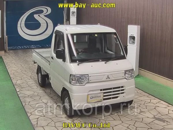 Фото Микрогрузовик бортовой MITSUBISHI MINICAB TRUCK кузов U61T гв 2013 груз 0,35 тн пробег 22 т.км