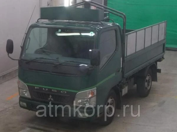 Фото Грузовик бортовой MITSUBISHI CANTER кузов FE70B год выпуска 2009 грузоподъемность 2 тонны пробег 369 тыс км