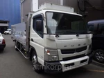 фото Грузовик бортовой MITSUBISHI CANTER кузов FEB90 гв 2014 багажник грузоподъемность 4,3 тн пробег 92 т.км