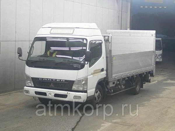 Фото Грузовик бортовой MITSUBISHI CANTER кузов FE82D гв 2009 гидроборт грузопод 3 тн пробег 199 т.км