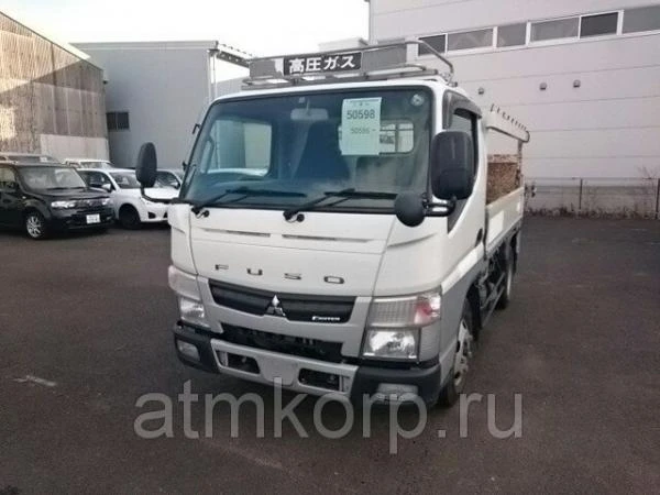 Фото Грузовик бортовой MITSUBISHI CANTER кузов FEA50 гв 2012 гидроборт багажник грузопод 3 тн пробег 154 т.км