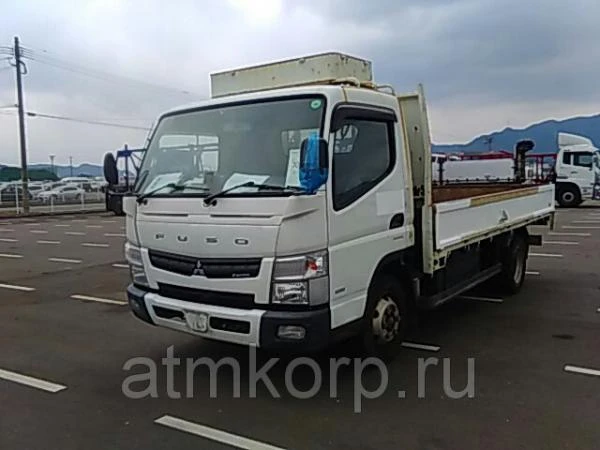 Фото Грузовик бортовой MITSUBISHI CANTER кузов FEB80 гв 2012 багажник грузопод 3,5 тн пробег 81 т.км