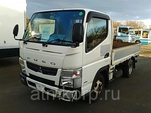 Фото Грузовик бортовой MITSUBISHI CANTER кузов FBA20 год выпуска 2012 грузоподъемность 2 тонны пробег 56 тыс км