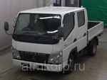 фото Грузовик двухкабинник бортовой MITSUBISHI CANTER кузов FB70B гв 2010 кабина 6 м груз 1,25 т пробег 192 т.км