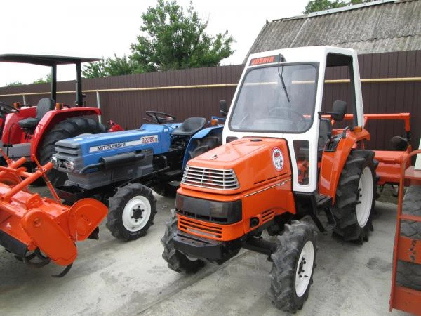 Фото Японский мини трактор Kubota X24D