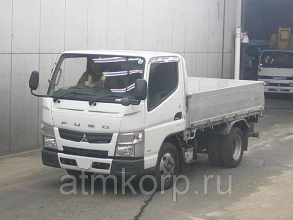 Фото Грузовик бортовой MITSUBISHI CANTER кузов FEA50 год выпуска 2011 грузоподъемность 3 тонны пробег 147 тыс км