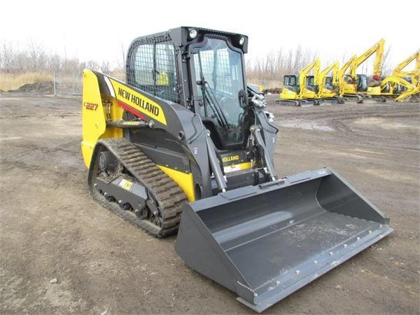 Фото Мини-погрузчик гусеничный New Holland С227