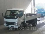 фото Грузовик бортовой MITSUBISHI CANTER кузов FE74DV год выпуска 2010 грузоподъемность 3 тонны пробег 423 тыс км