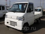 фото Микрогрузовик бортовой MITSUBISHI MINICAB TRUCK гв 2012 полный привод 4х4 груз 0,35 тн пробег 131 т.км