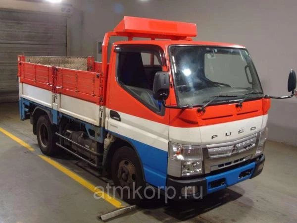 Фото Грузовик бортовой MITSUBISHI CANTER кузов FEA50 гв 2012 гидроборт грузопод 3 тн пробег 199 т.км