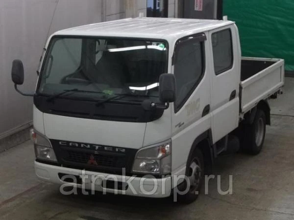 Фото Грузовик двухкабинник бортовой MITSUBISHI CANTER кузов FB70B гв 2010 кабина 6 м груз 1,25 т пробег 192 т.км