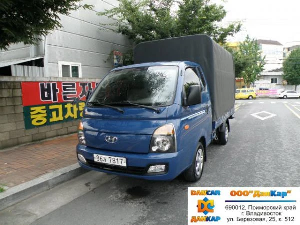 Фото Hyundai Porter (с тентом), 2013 г. (2WD, 1 каб.)