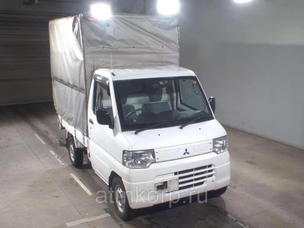 Фото Микрогрузовик бортовой тентованный MITSUBISHI MINICAB TRUCK кузов U61T гв 2012 груз 0,35 тн пробег 153 т.км