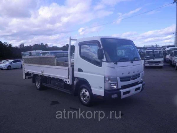 Фото Грузовик бортовой MITSUBISHI CANTER кузов FEB50 гв 2012 гидроборт грузоподъемность 2 тн пробег 285 т.км