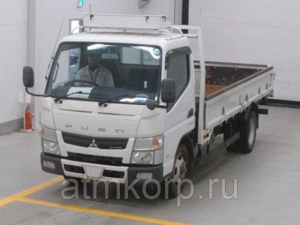 Фото Грузовик бортовой MITSUBISHI CANTER кузов FEA50 год выпуска 2011 грузоподъемность 3 тонны пробег 233 тыс км