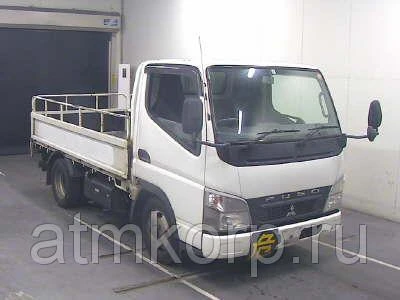 Фото Грузовик бортовой MITSUBISHI CANTER кузов FE70BS год выпуска 2010 грузоподъемность 2 тонны пробег 298 т.км